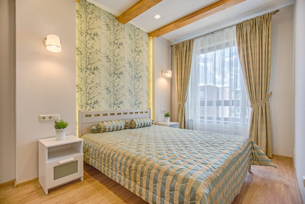 pexels-photo-1571450 A luxurious and contemporary bedroom design with patterned wallpaper and natural lighting, located in Vilnius, Lithuania.