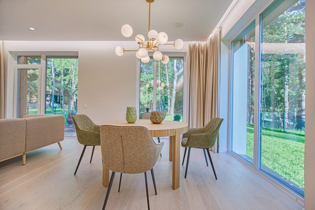 pexels-photo-1571463 Elegant dining room featuring modern furniture and large windows for natural light.